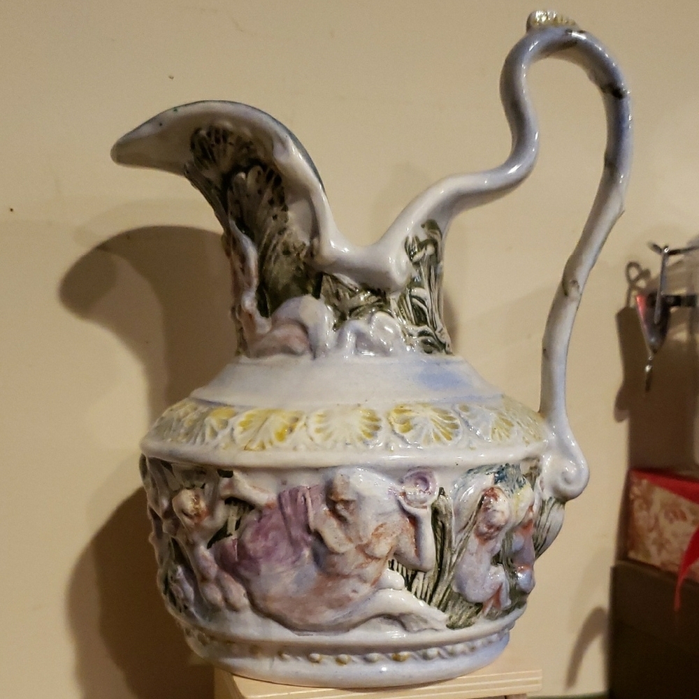 Ceramic Pitcher with Relief Sculpture and Gold Accents